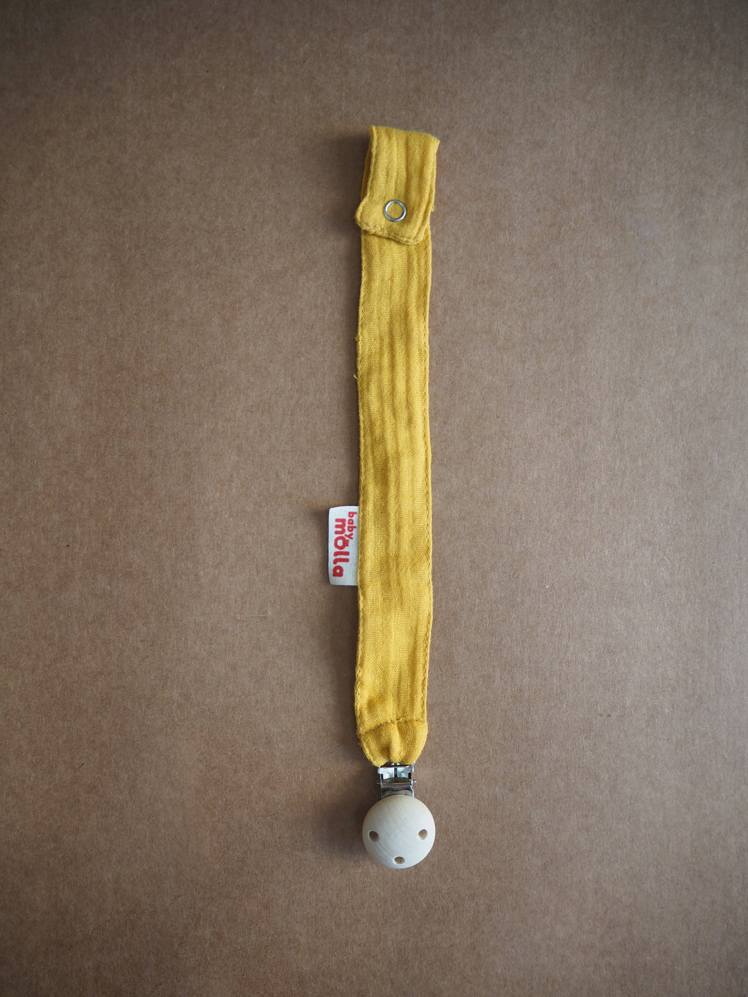 Mustard pacifier holder