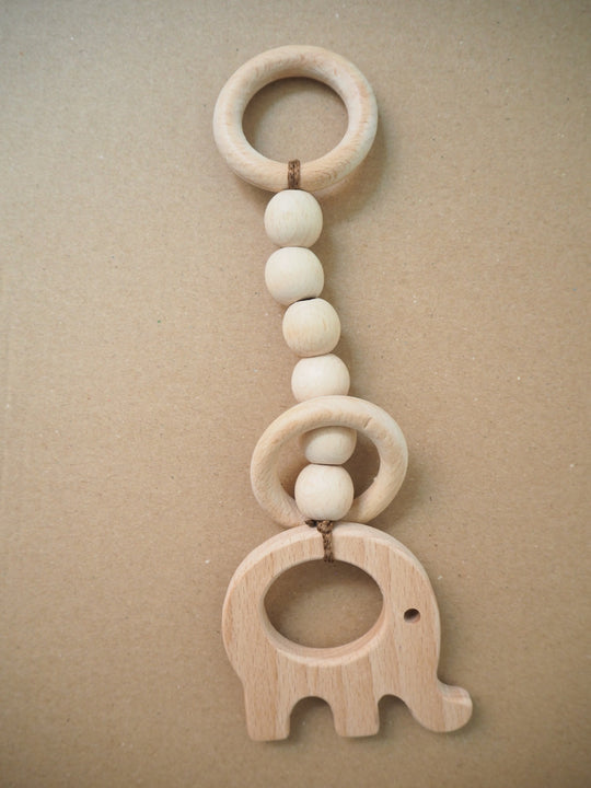 Elephant teether - kruarse dhëmbësh + varese per baby gym