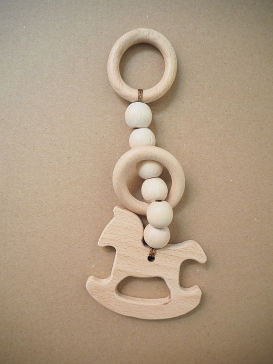 Horse teether - kruarse dhëmbësh + varese per baby gym